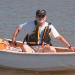 Picture of a man in a dinghy
