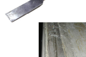 A scraper or box knife would have a tough time cutting through this hardened and gritty toerail adhesive, below, but removing it with a heated chisel was a breeze.