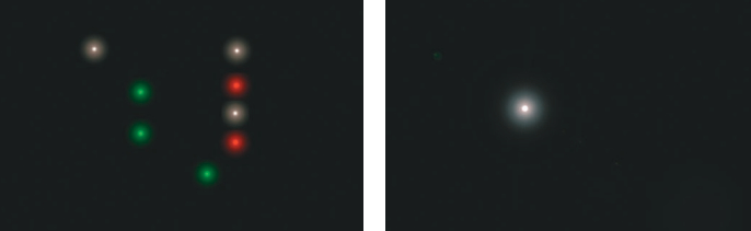 This is about the most complicated light pattern you are likely to see, at left. The two green lights in a vertical line mean a vessel that is a dredging or otherwise working underwater (although this boat will show two red lights on the side on which she is working). The two green lights indicate the safe passage side for other vessels. The two white lights highest above the water are the normal masthead running lights; the green light closest to the water is the normal starboard side running light. Finally, any vessel restricted in her ability to maneuver uses the “red-over-white-over-red” vertical pattern. At right, the simplest light, plain white, should mean “steer clear” because it could be the stern light of a power-driven vessel or the stern light of a sailing vessel. It could be the all-round light of a small power-driven vessel, a sailing vessel, a boat under oars, any of which could be heading in any direction. Until you know for sure, you must be extremely cautious.
