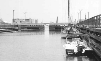 . . . and the lock gates ahead open as water flows in.