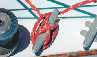 The cleat hitch is not a good idea when locking; it tightens under load. Lines must be able to adjust to a boat’s rise and fall.