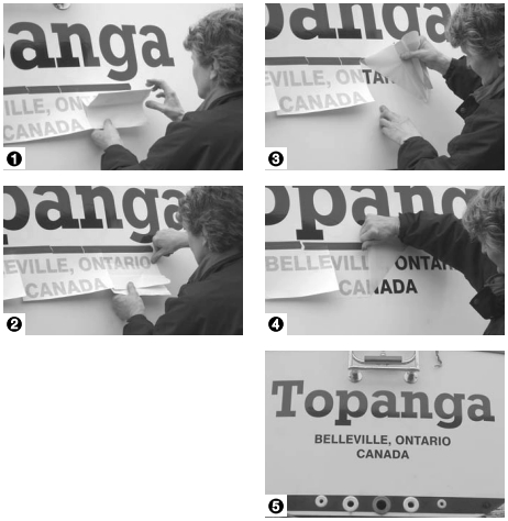When the graphic has been aligned and taped in place, Al peels off the waxed paper backing, keeping the sticky back away from the hull (1), he uses his thumb to apply the lettering from the top down (2), and carefully removes the top cover from the lettering (3). Then he can move on to the next section (4) until the entire transom has been completed (5).