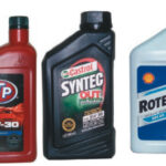 From top: a typical multi-weight oil for gasoline service, synthetic motor oil for gasoline and diesel applications, and straight weight oil for diesel service.