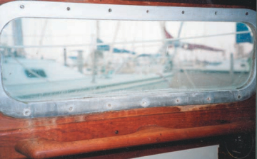 Leaks from the Tartan’s ports had stained the interior teak and corroded the inner frame.