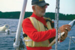 A man sailing a boat