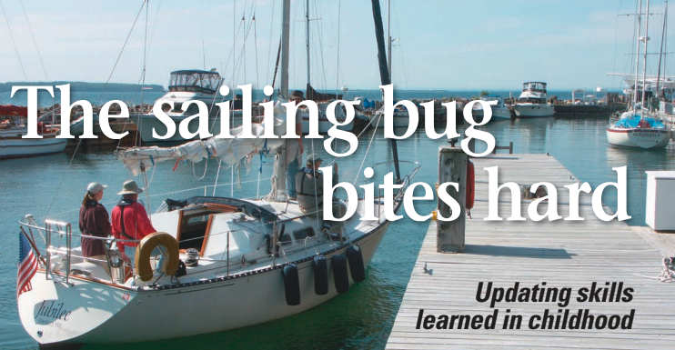 Theresa docks the boat, her first assignment while taking the Sailboats Inc. Charter Certification Course in Bayfield, Wisconsin. Theresa and three other students practiced maneuvers using a C&C 29 named Jubilee.