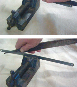 Don’t have a scraper aboard? Don’t despair. You can make an excellent one using only a flat file and a hacksaw blade, top photo. Use the file to square off the top edge of the saw blade, second photo. The trick is in the third photo: use the tang of the file and rub it firmly along both top edges at a 30-degree angle to create a fine burr. Does this work? The fourth photo tells the story.