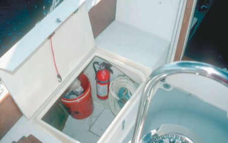 The new deeper cockpit locker on Jack’s Bristol 29.9 has room for a bucket to contain cleaning supplies, a fire extinguisher, canvas weathercloths, water hoses, fenders, and a sailbag.