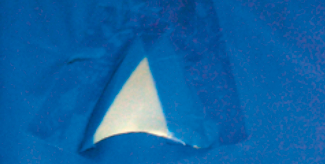 Vent in place on shrink-wrapped boat.