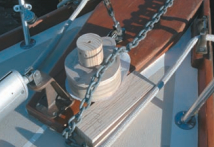 John used scale models to try out possible areas on the deck for the location of the windlass. The chain stretching aft pointed the way to the best location for the equipment.