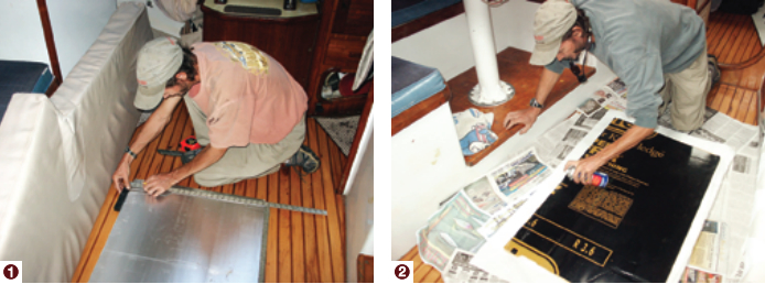 Dave cuts the Celotex to size for use in the V-berth, (1), and sprays the edges, (2), to create a tacky seal for the fabric covering.