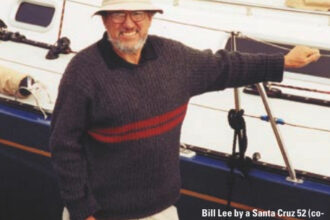 Bill Lee by a Santa Cruz 52 (co-designed by Bob Smith) near his office in Santa Cruz Harbor.