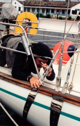 Brion inspects the rigging on Ono with a 50x handheld microscope.