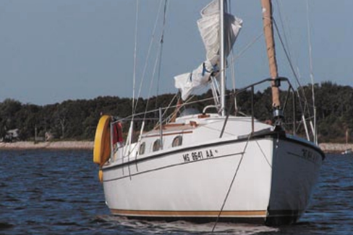 Curtis and Tara Villamizar sail Remote Access, a 2001 model (#629), which is still trying to become a good old boat, out of Pleasant Bay on Cape Cod, Mass.