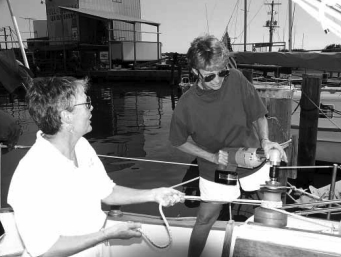 The wives, Genie Sandifer and Gayla Schmitt, give it a go.