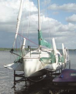 A folded tri can occupy a standard dock space. In fact, its folded (and trailerable) beam of 8 feet 2 inches makes it narrower than most cruising monohulls.