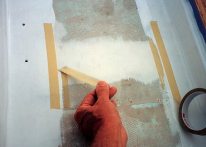 When painting barricaded sections maintain a sharp edge by laying fresh tape against the edge of the old tape. Then peel the old tape back carefully.