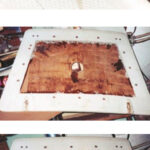 The job begins with a router cut, above, to allow for the removal of the top fiberglass layer. Next, the fiberglass skin is peeled back and the wet core is removed, at center, ready for a replacement layer of Masonite. While curing, the repair is clamped through the center hole, bottom.