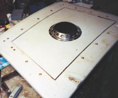 The finished hatch before white silicone sealant was substituted for the polyurethane which did not weather well.