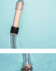 The cardboard tubes inside the hose clamps, shown at top, must remain in place until the hose clamp is used. The original test setup, middle, and the salvaged test with a stainless-steel clamp, above. This test also failed.