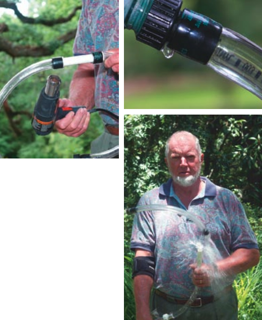 Bill Sandifer heats the hose clamp to prepare for his test, at left. The final leak, at right. Our rather wet tester, below right.