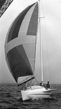 Garry designed and built the Delta 26 with the mast aft and two stays forward so that both the jib and staysail, set on furlers for convenience, would enjoy clean leading edges. The Gun Mount fitted to the bow pulpit enabled setting spinnaker from the cockpit. The winglets provide outboard seating for the crew where their weight contributes to stability. The boat is featured in his 1986 book, Ready About!
