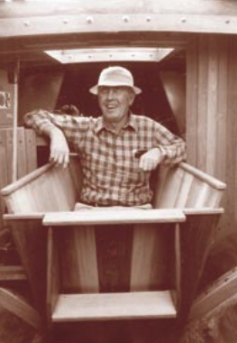 Lyle enjoys the sitting tub Larry built for Lin, at her insistence, aboard Taleisin, during the boat’s construction in 1983.