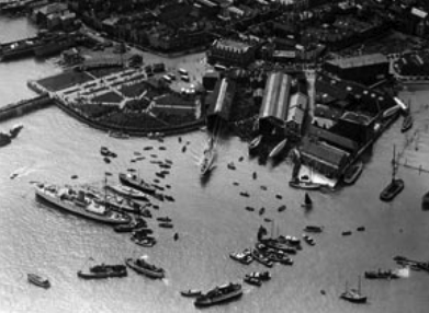 The J-class sloop Endeavour II (being launched, middle of photo) was campaigned for the America’s Cup by Sir T. O. M. Sopwith. Built and launched in 1936 at Camper & Nicholsons, she was designed by Charles Nicholson.