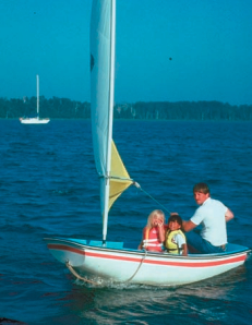 Tom takes the girls sailing.