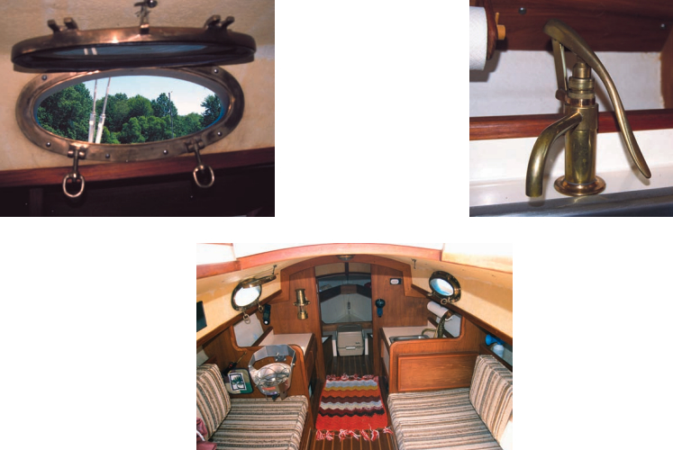 The bulkheads and cabinetry, below, are finished with teak veneer. All trim is solid teak. The headliner is foam-backed vinyl and, along with a teak-and-holly sole, finishes off the cabin in proper yacht fashion. The four bronze portlights, left, open to provide cross ventilation and natural illumination for the cabin. The use of bronze hardware, right, both topside and below, adds to the Rob Roy 23’s “salty” looks.
