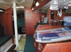 A full-sized nav table is situated opposite a full-sized galley (not shown here). Berths are 6 feet 6 inches. Just because she’s meant to be raced “does not mean the crew sleeps on a bed of nails or eats C rations.”