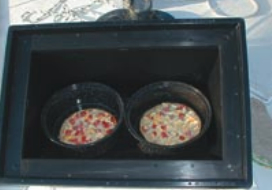 Another Ilse family favorite, solar pizza, shown below. Foods that work well for a slow cooker or pressure cooker are perfect for a solar cooker.