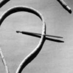 Step 1. Measure five or six fid lengths from the end of the line. Either tie a knot or carefully put a fid through the cover and core. Holding the knot or fid, smooth the cover from the knot to the end.