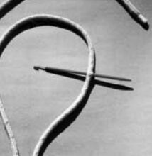 Step 1. Measure five or six fid lengths from the end of the line. Either tie a knot or carefully put a fid through the cover and core. Holding the knot or fid, smooth the cover from the knot to the end.