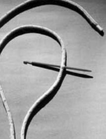 Step 1. Measure five or six fid lengths from the end of the line. Either tie a knot or carefully put a fid through the cover and core. Holding the knot or fid, smooth the cover from the knot to the end.