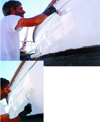 Tipping out the paint. Note the roller in the other hand. The pay-off: Don rolls out the paint.