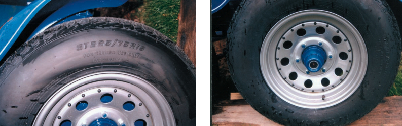 Make sure that your trailer tires are rated for “Trailer Use,” at left. Bearing protectors, at right, are designed to keep water out of your wheel bearings. Grease can be routinely added by means of the zerk fitting (center of hub).