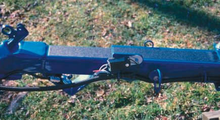 Coupler with integrated tongue extender in the secured position.