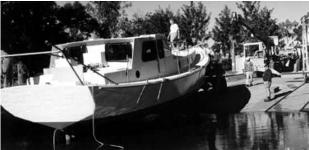 Having already floated high in a flood aboard Soleares, Alan and Patricia Lucas could afford a great deal of smugness in knowing she would float exactly where predicted at the official launching on June 12, 1999.