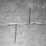 Cable ties to the rescue: when the wires inside Gregg’s mast kept him up at night, he was determined to fix the problem by preventing them from dangling loosely.