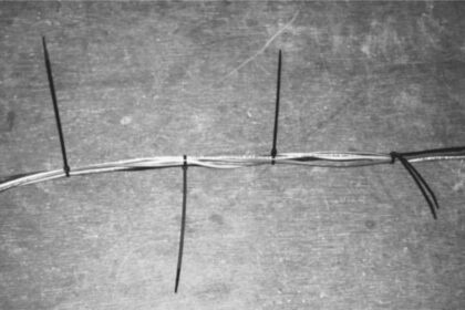 Cable ties to the rescue: when the wires inside Gregg’s mast kept him up at night, he was determined to fix the problem by preventing them from dangling loosely.