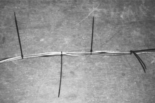 Cable ties to the rescue: when the wires inside Gregg’s mast kept him up at night, he was determined to fix the problem by preventing them from dangling loosely.