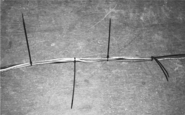 Cable ties to the rescue: when the wires inside Gregg’s mast kept him up at night, he was determined to fix the problem by preventing them from dangling loosely.