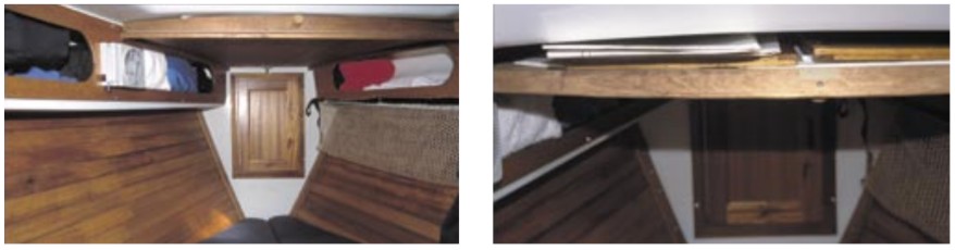 The V-berth is finished with wood battens. Notice the large flat tray with a flip-down door above the V-berth. It’s a perfect place for storing charts.