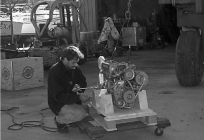 The new Yanmar engine is uncrated in preparation for installation.