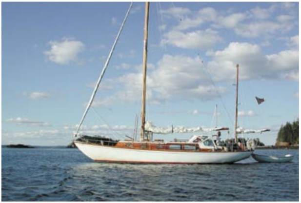 Christmas had been owned and loved by the members of one family for 35 years (and was even stored inside each winter) before meeting with neglect. Now she sails again with Tom Young and his family, a foursome that is appreciating her fully and treating her once more in the manner to which she had previously become accustomed.