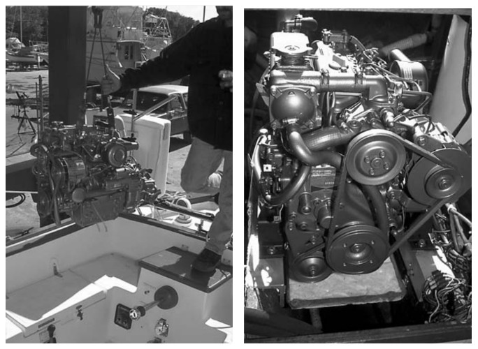 At left, the Travelift brings in the new engine. The new engine, as seen from inside the cabin, looking aft through the engine access doors, at right.