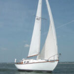 Aldebaran sails the sound near Diamondhead, Mississippi, above.