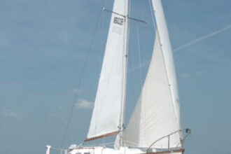 Aldebaran sails the sound near Diamondhead, Mississippi, above.