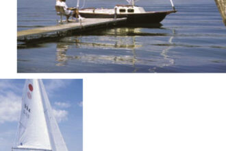 Halcyon, a freshly restored 1982 Victoria 18, is perfectly at home near a lakeside retreat.